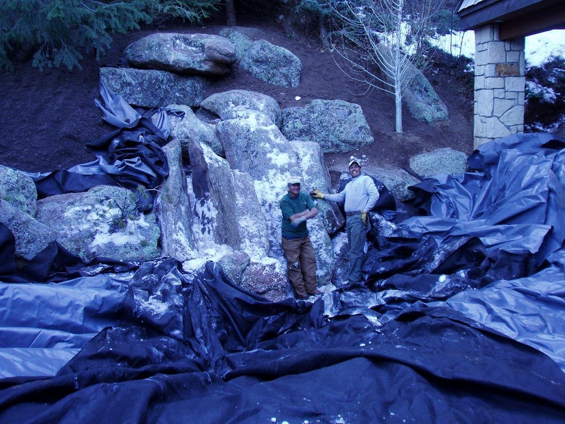 A scale image of a garden boulder