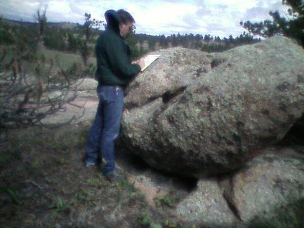 The faces of a garden boulder